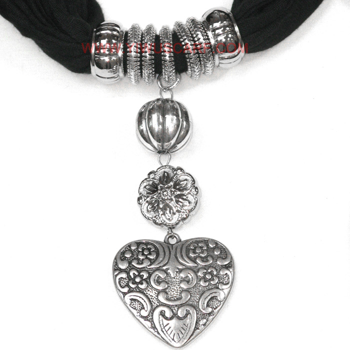 Scarf with pendant