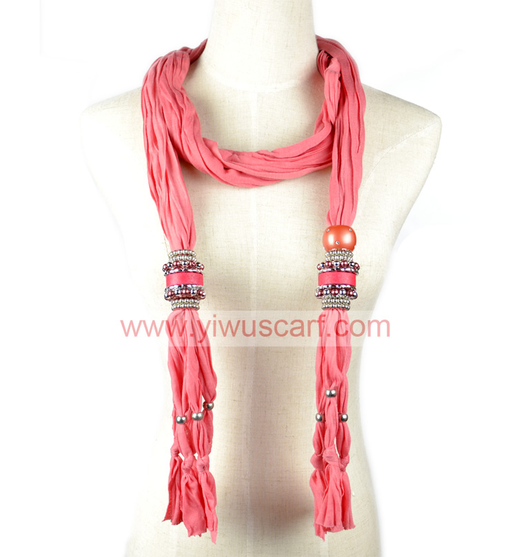 Scarf with jewelry