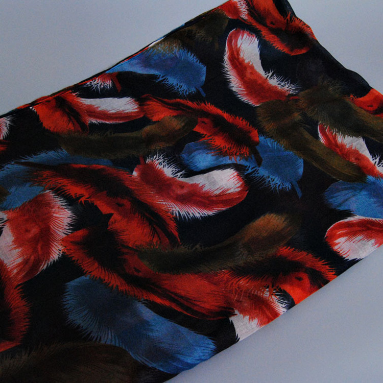 Feather printed silk scarves