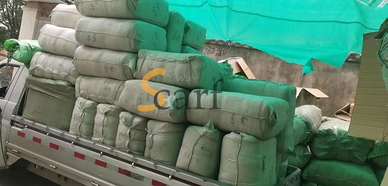 5000 scarves are packed in compression bags to reduce the weight of Australian customers
