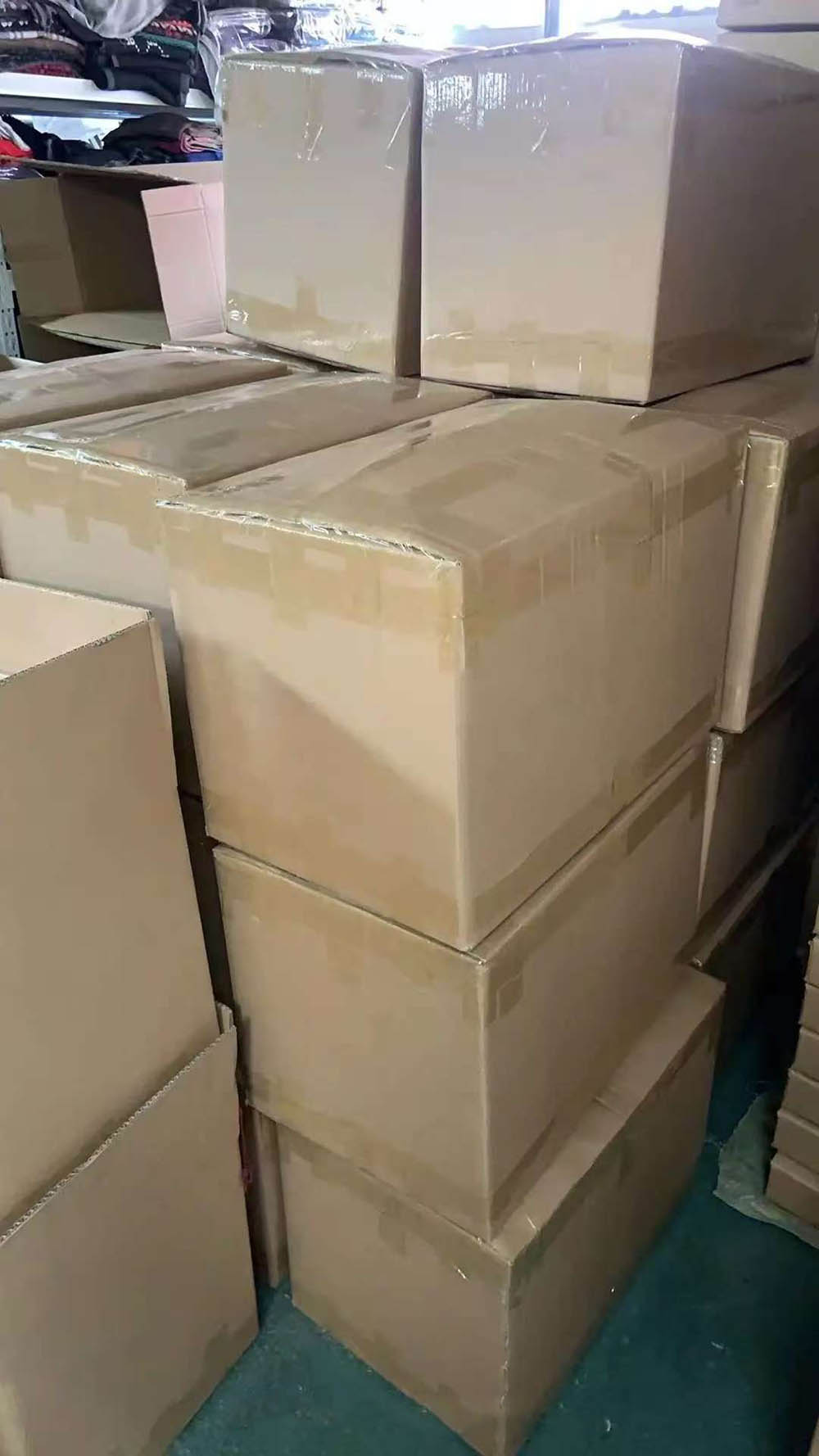 2000 knitted scarves boxed and shipped to UK