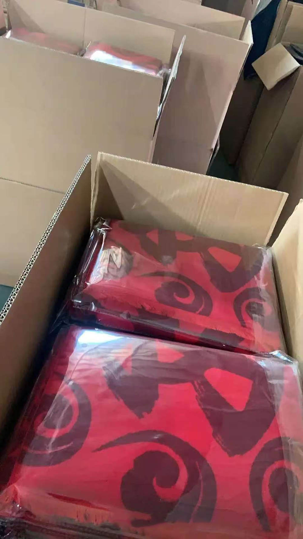 2000 knitted scarves boxed and shipped to UK