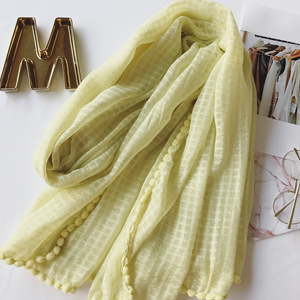 A hair bulb with plaid scarf