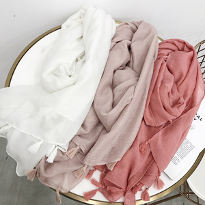 Solid color gold fringed scarves