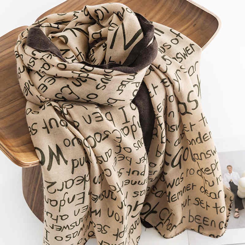 Europe the United States fashionable English alphabet print scarf female simple commuting lengthened plain neck scarf light luxury cape