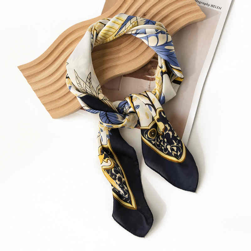 Leave a small pocket square with a floral pattern on a silk scarf for spring outing