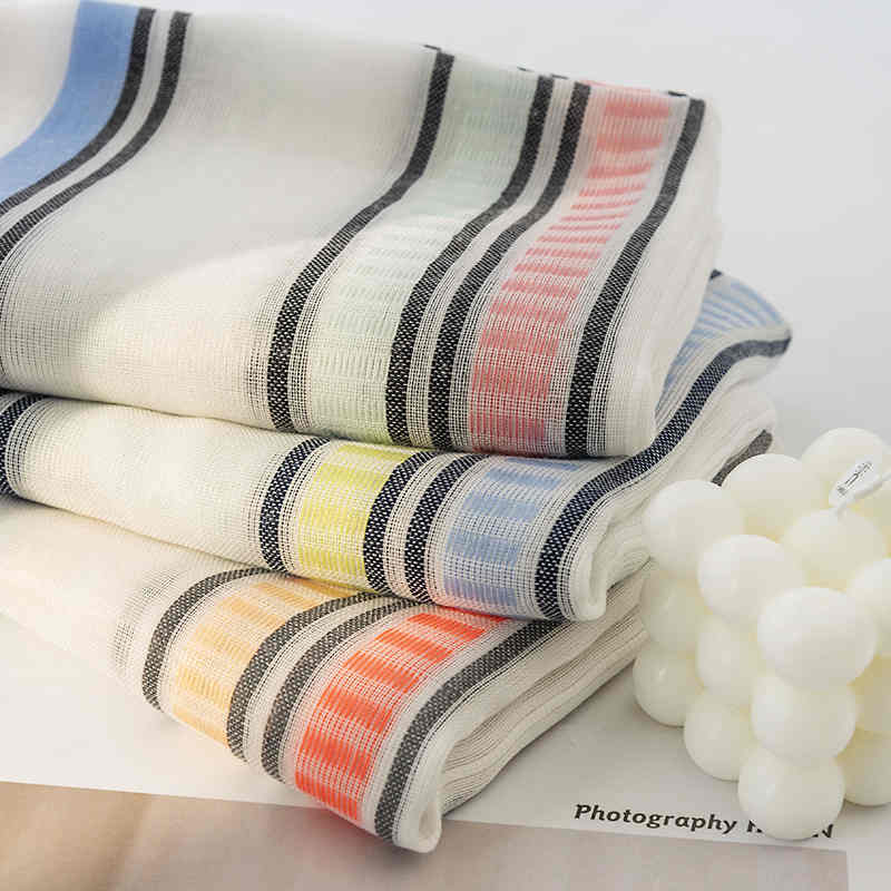 Striped scarves go with everything from commuter fashions to fringed necks to sweet shawls