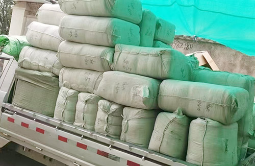 5000 scarves are packed in compression bags to reduce the weight of Australian customers