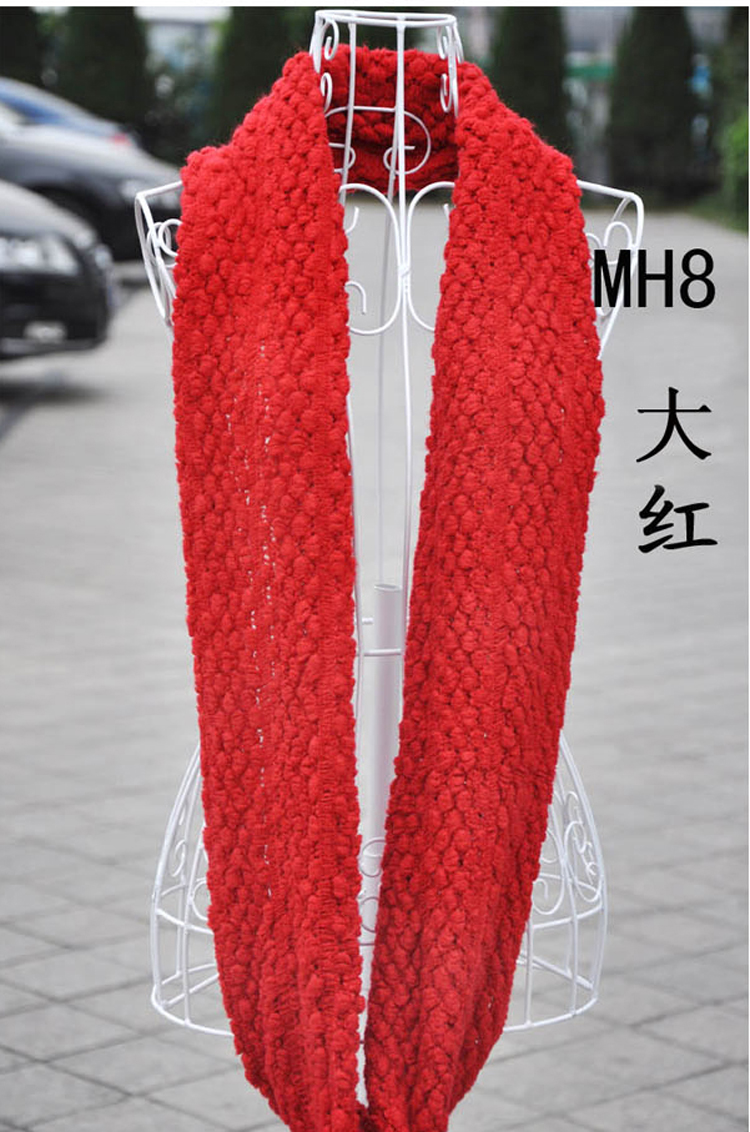 Women knitting scarf