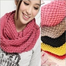 Women knitting scarf
